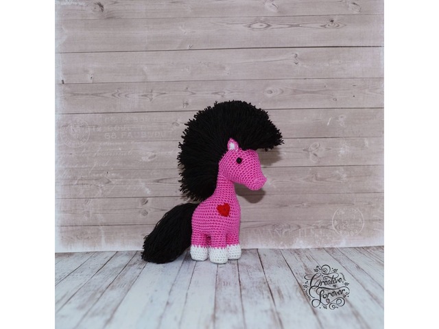 Рожева конячка з чорною гривою