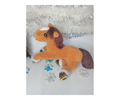 Конячка плюшева