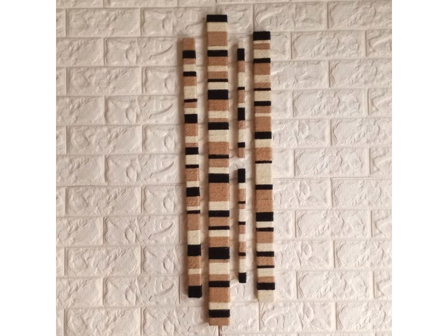 Настінний декор у стилі лофт з дерев’яних планок та джутового шпагату