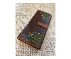 Жіночий гаманець з натуральної шкіри на замовлення.