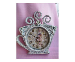 Часы в виде чашечки