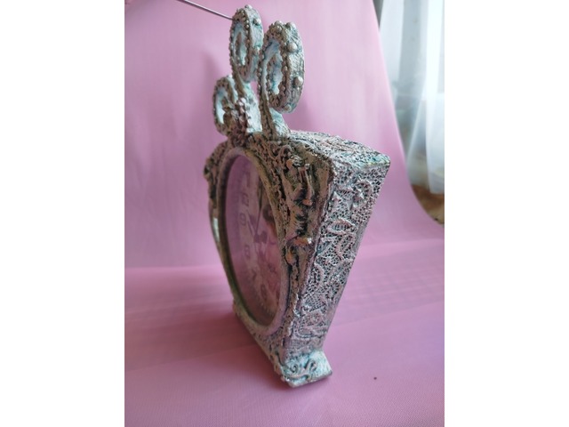 Часы в виде чашечки