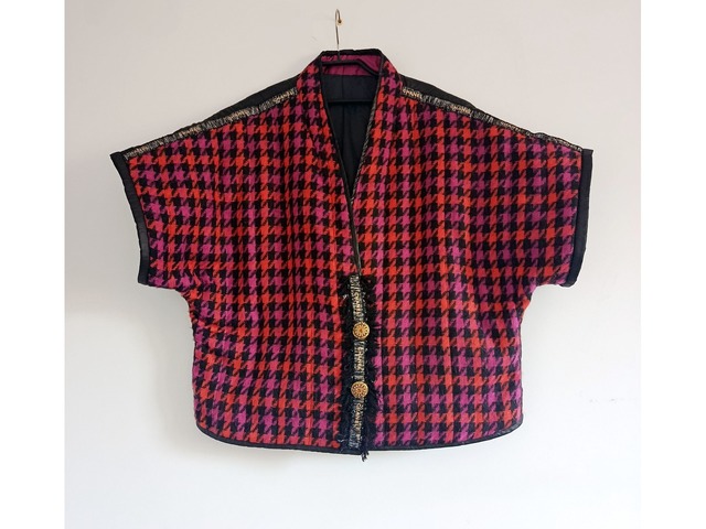 Трендовий теплий жилет