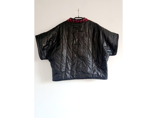 Трендовий теплий жилет